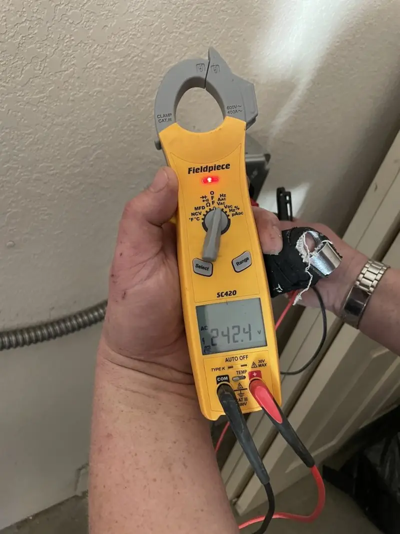 Voltage testing with clamp meter during Aluminum Wiring Replacement in Cedar Grove